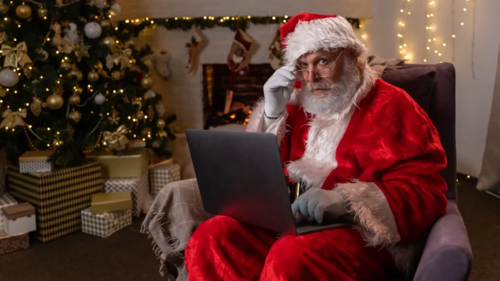 Weihnachtsmann mit Computer